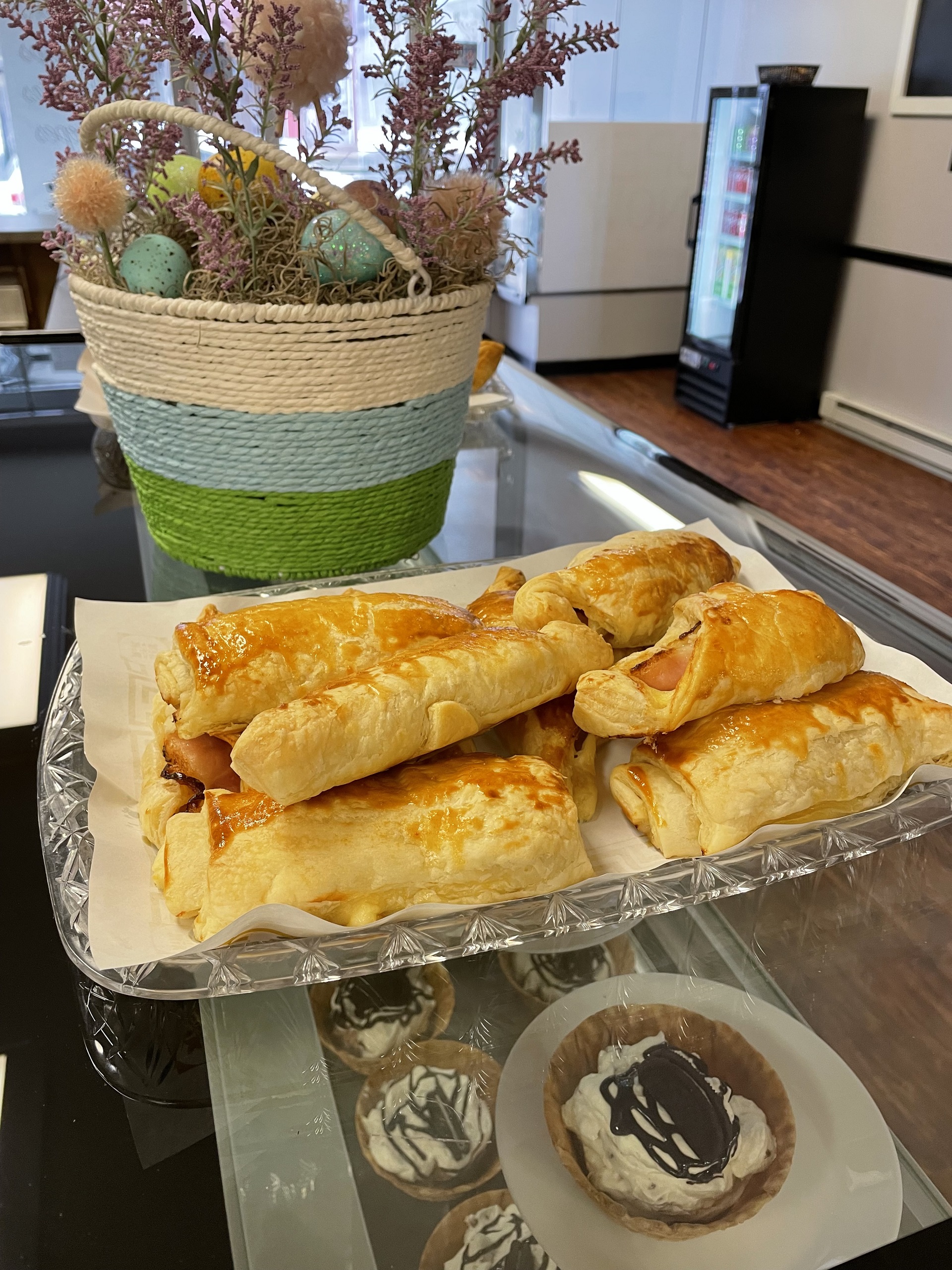 Kat's savory croissants filled with ham and cheese on display at the Minersville location and below you see homemade sweet cream with oreos in a handmade waffle bowl.