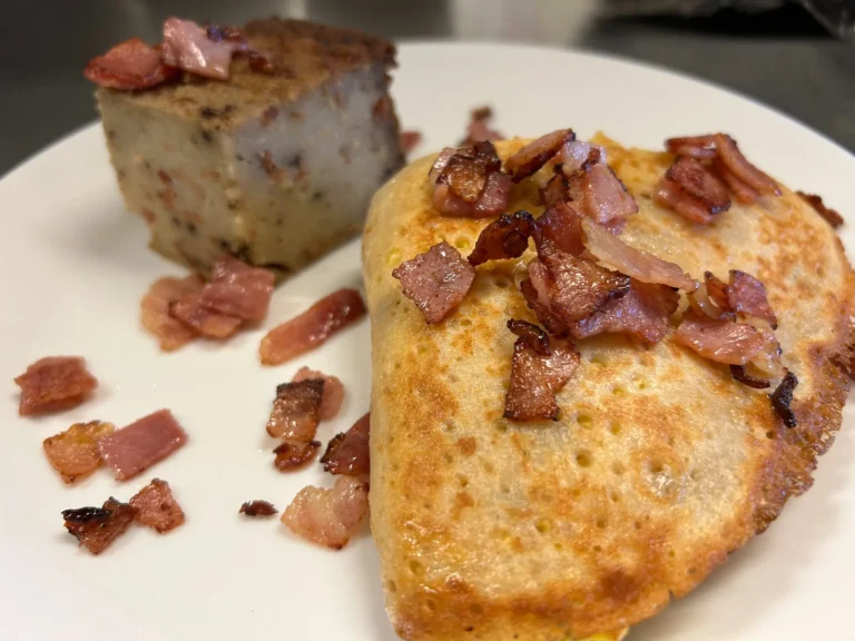 Ham, egg, and cheese breakfast crepe served with a savory potato babka side at Kat’s Café & Restaurant.