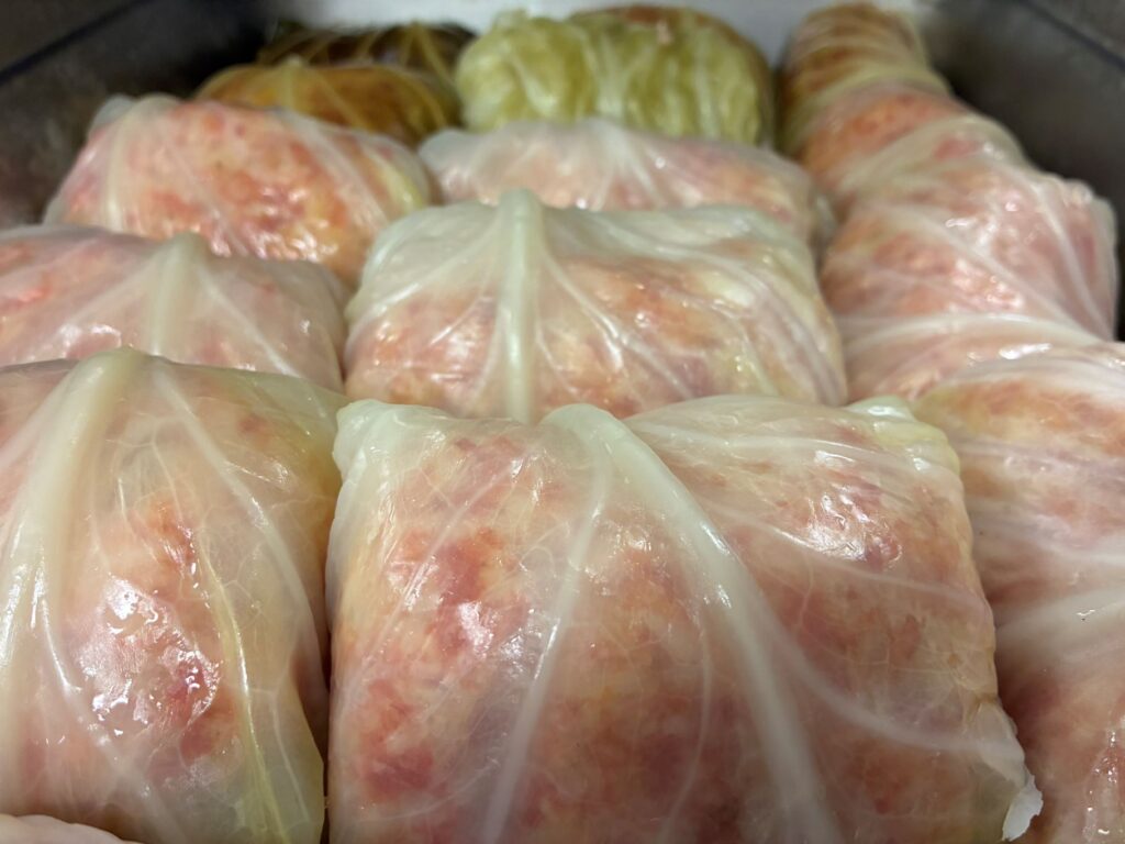 Kat's Halupki Gołabki Laid Out in Neat Rows in a Deep Pan Placed in the Oven.