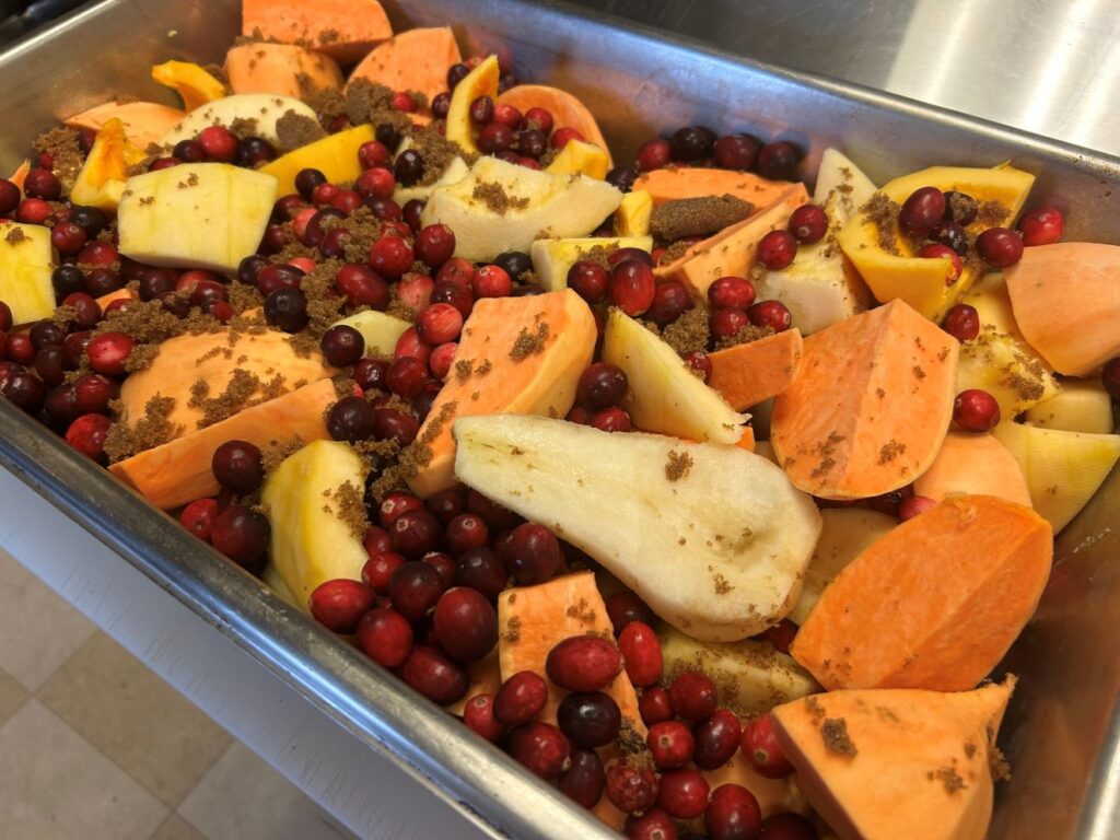 A photo of Kat's Pilgrim Pierogi Produce from Harvest-Time in a Deep Oven Tray to Be Baked into Filling.