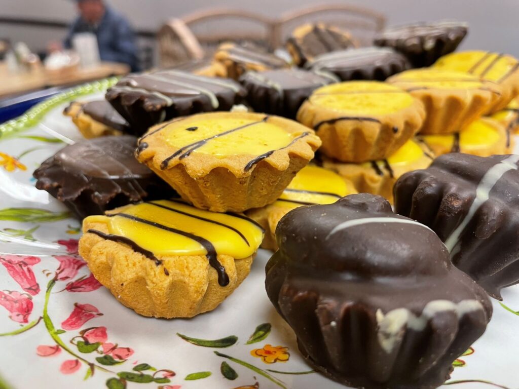 Kat's Tea Cookies having fudge, egg nogg, coconut, coffee, chocolate, and other cookie flavors.