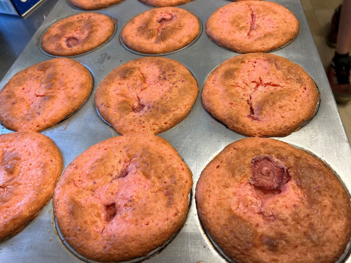 Strawberry Banana Mini Cakes right out of the oven fluffy and still warm in the baking tray.