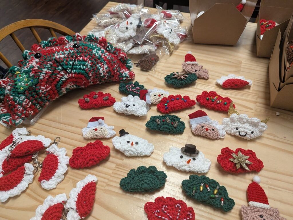 Kat's Pierogi Products with a huge selection of Holiday Ornaments and a multi-color Christmas pillow.