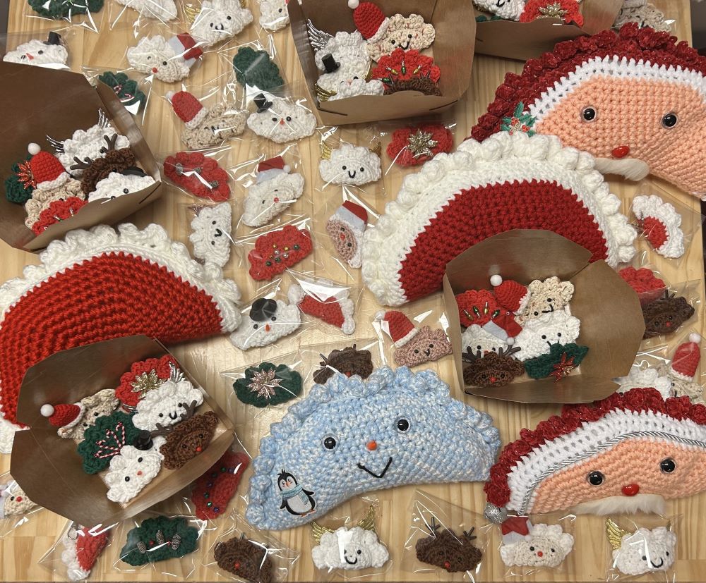 Kat's Pierogi Products laid out on a table on display.