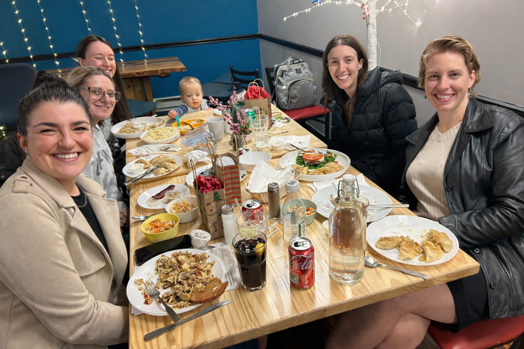 A photo of a group of female friends dining in at Kat's for some homemade food and good times.