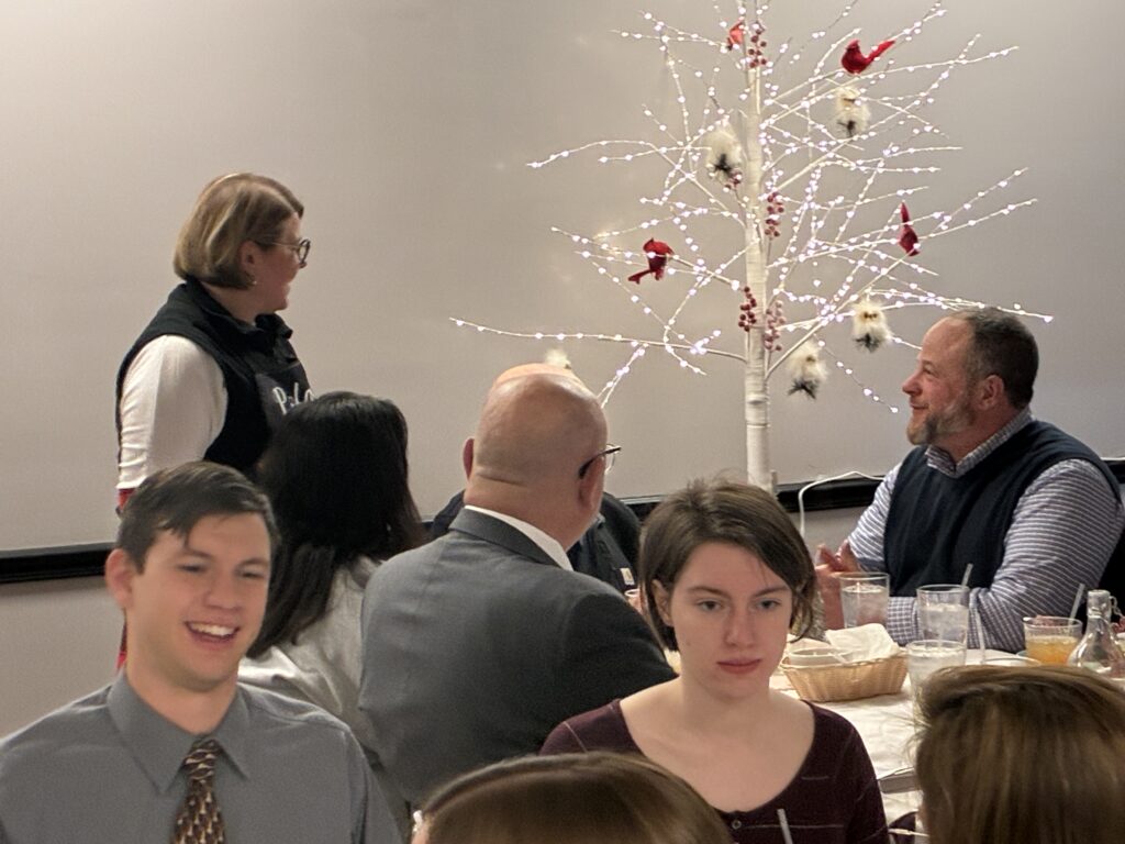 Kat's 2nd Annual Christmas Eve Holy Supper Chef Interacting with Guests.