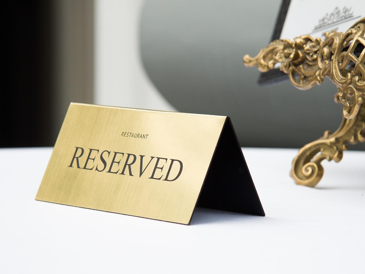 Reserved table sign at Kat's Café & Restaurant for dine-in reservations.
