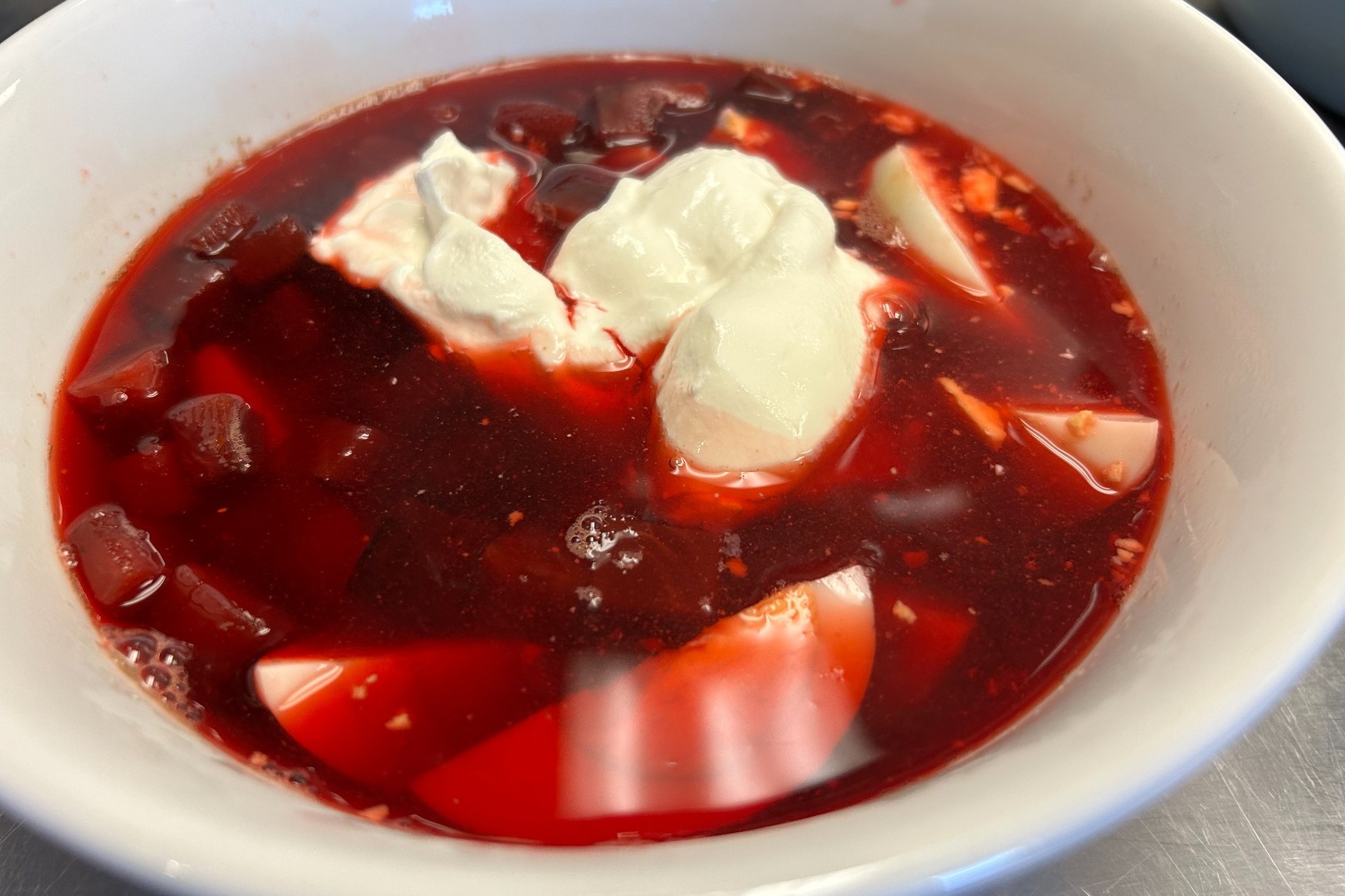 Classic red beet borscht soup topped with sour cream at Kat’s Café & Restaurant.