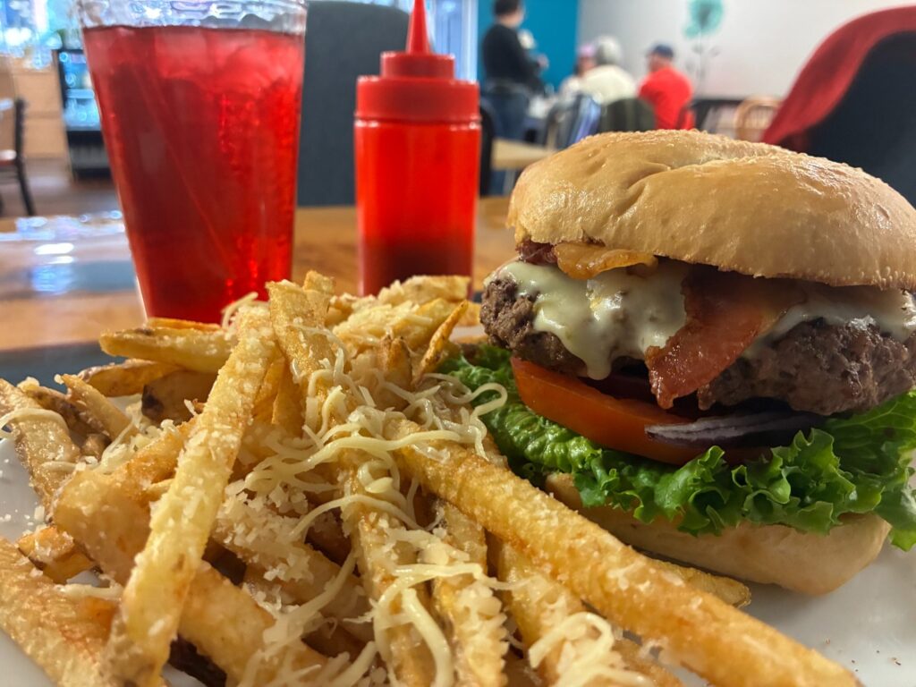 Smash burger with Parmesan fries at Kat’s Café & Restaurant.