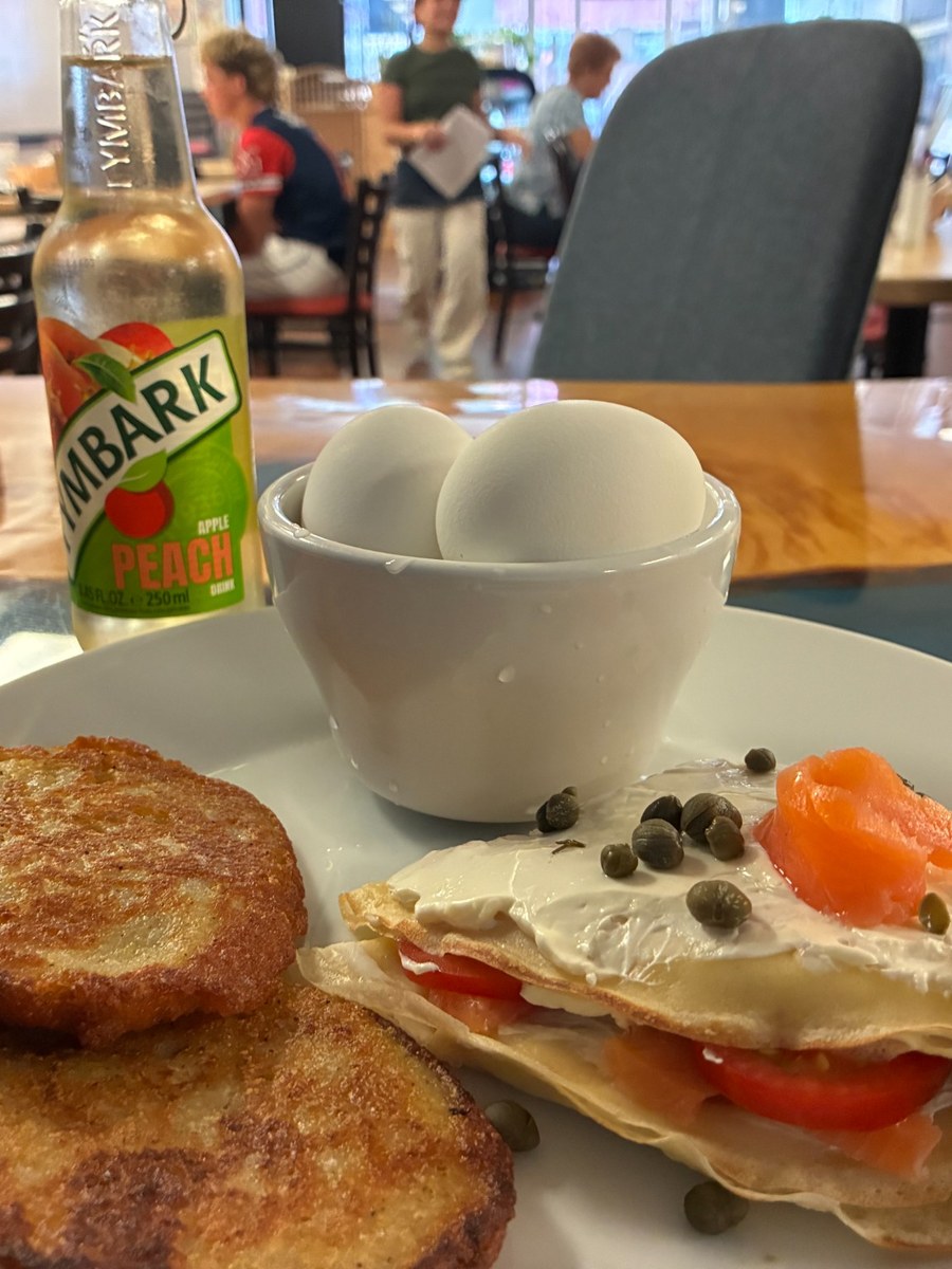 Salmon and cream cheese lox blintz served with potato pancake blinis and hard-boiled eggs at Kat’s Café & Restaurant.