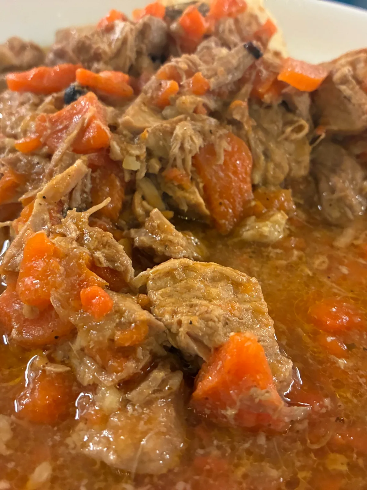 Goulash stew with tender meat and carrots served with mashed potatoes or blinis.
