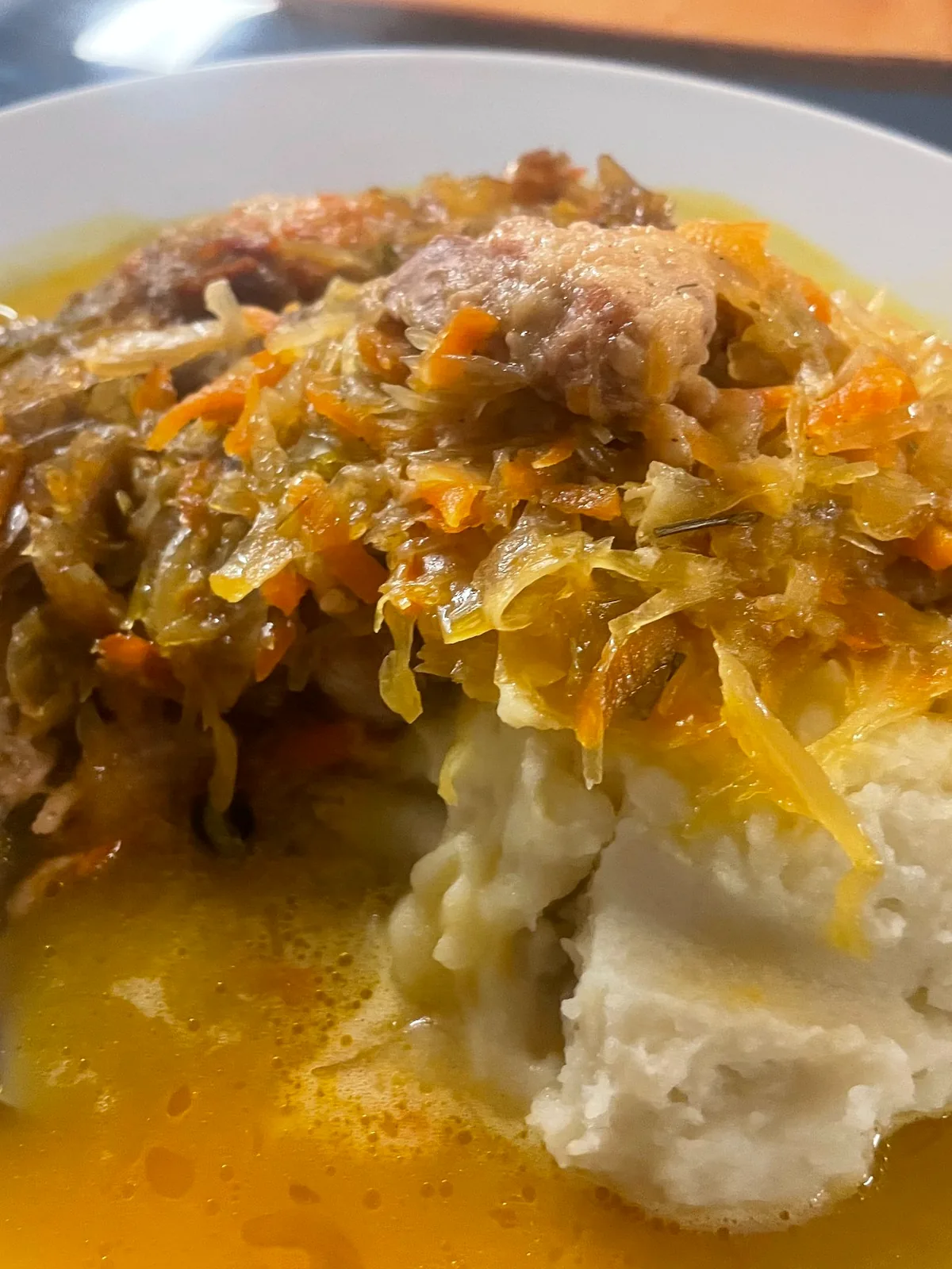 Pork and sauerkraut served over mashed potatoes.