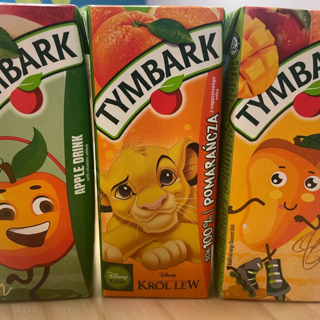Juice boxes for kids in apple, orange multivitamin, and mango flavors at Kat's Café & Restaurant.