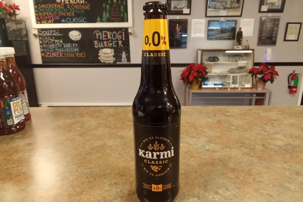 Bottle of Karmi Classic 0.0 non-alcoholic malt beverage at Kat's Café & Restaurant.