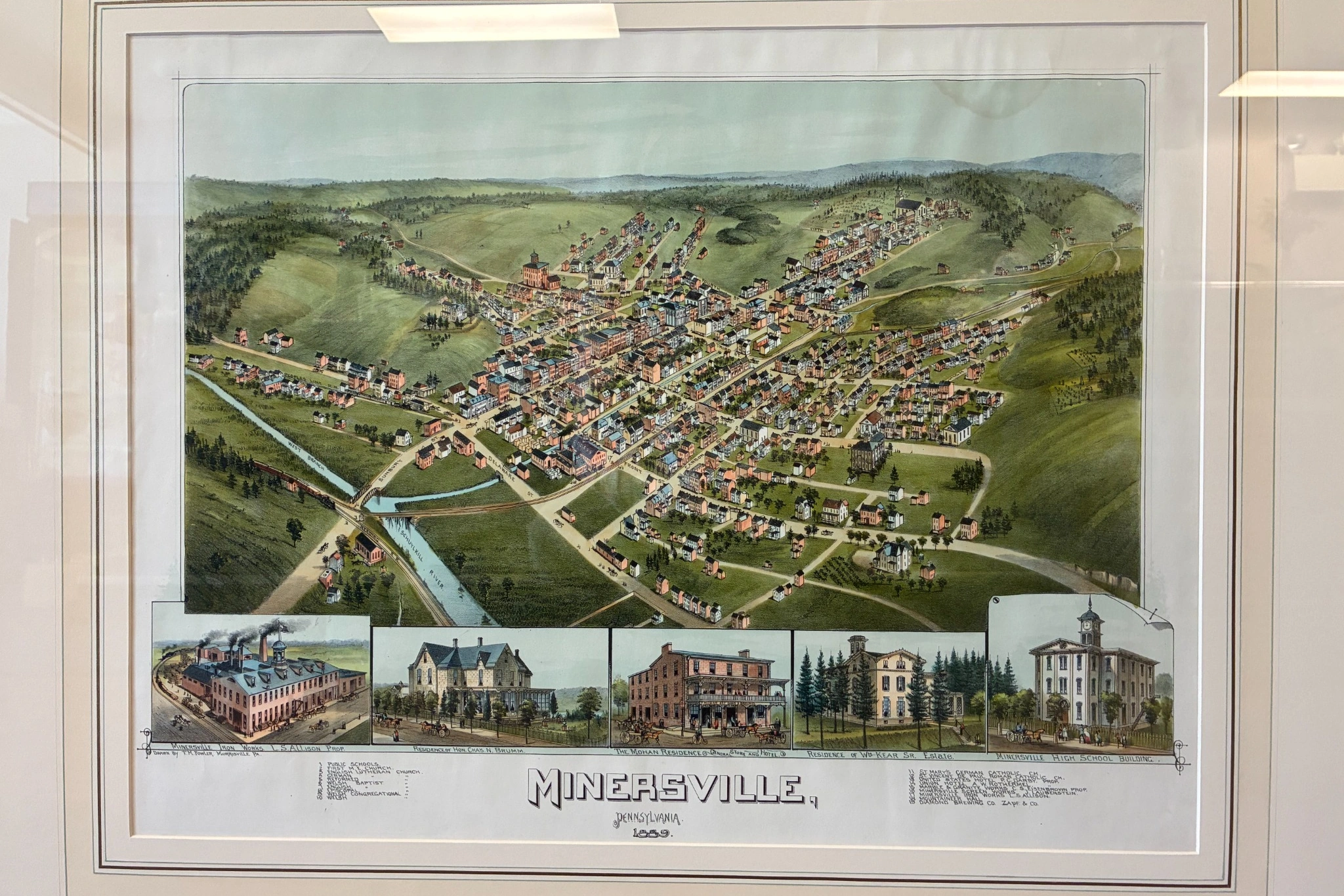 Framed historic bird’s-eye view print of Minersville, Pennsylvania, on display at Kat’s Café & Restaurant.