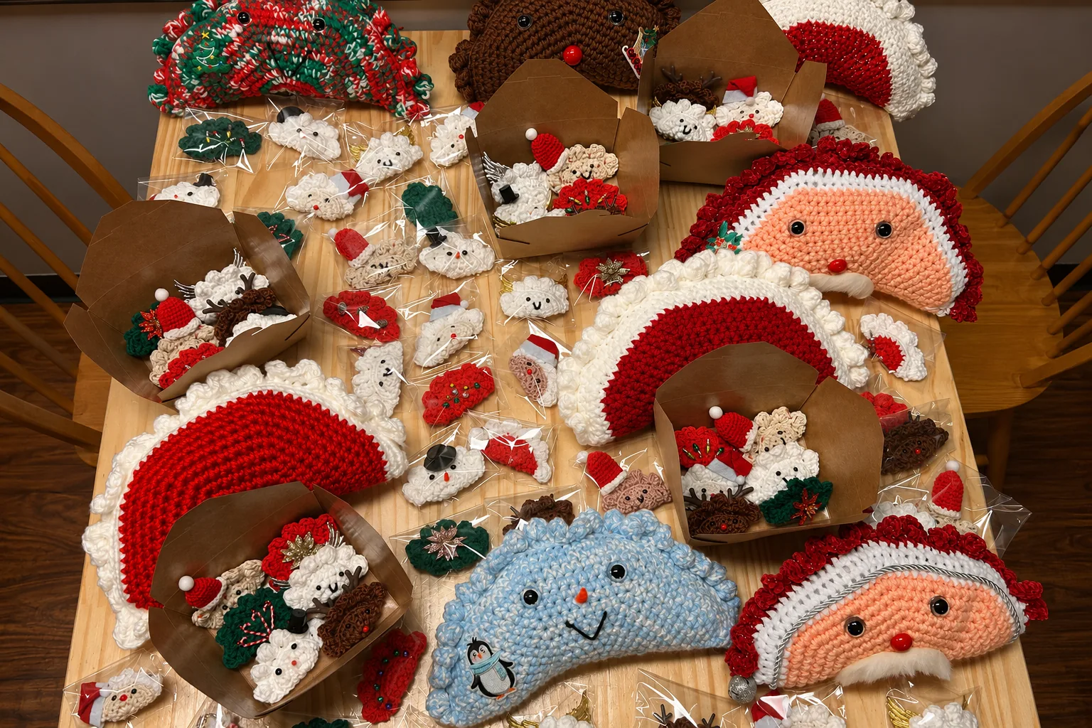 Handmade Pierogi Souvenir Gifts at Kat’s Assorted handmade crochet pierogi souvenirs, ornaments, and pillows displayed with small holiday gift boxes at Kat’s Café & Restaurant.