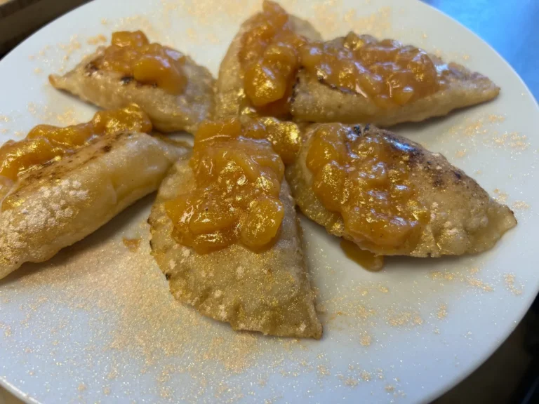 Sweet peach pierogies topped with homemade peach compote at Kat’s Café & Restaurant.