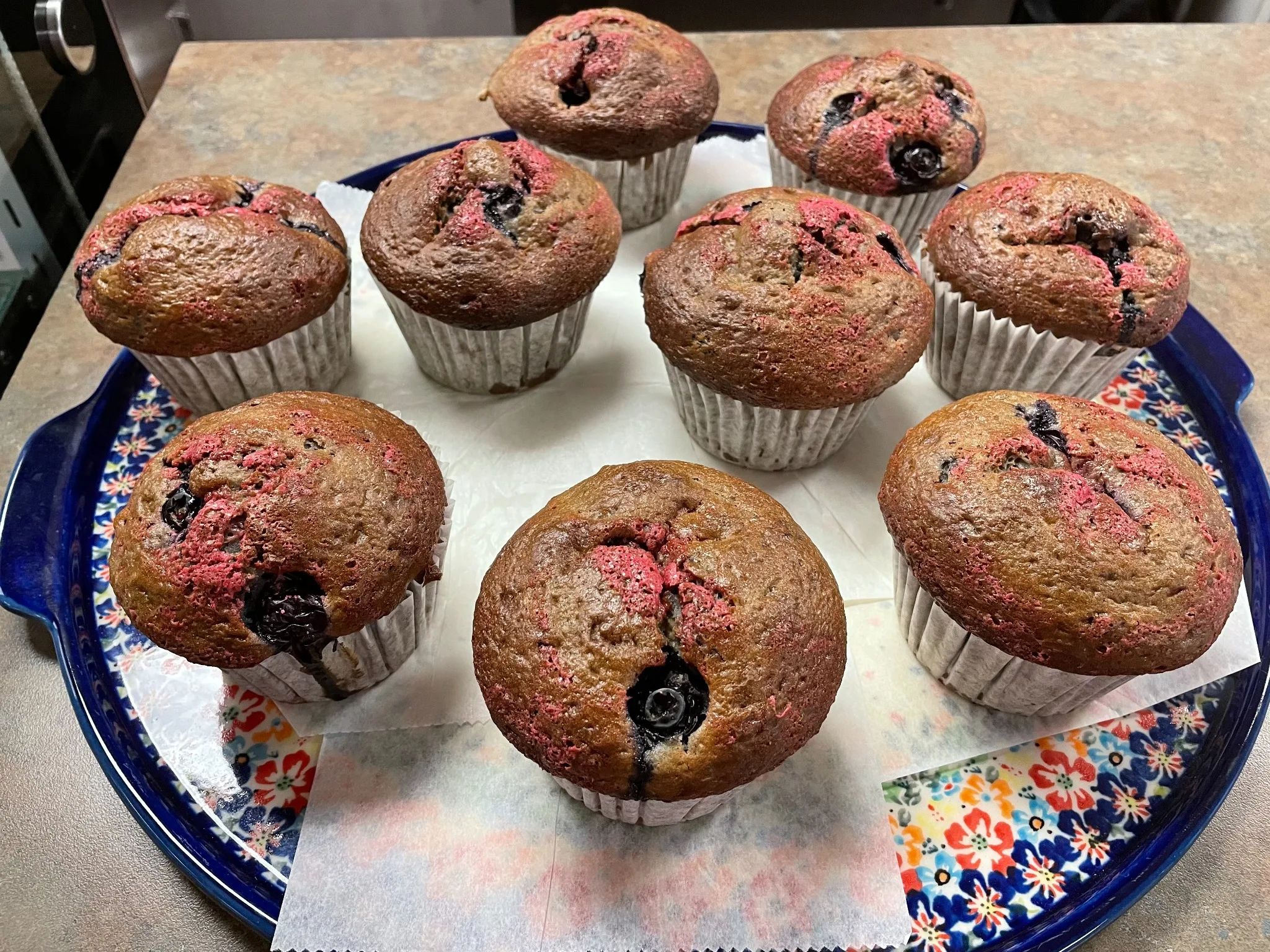 Fresh-baked berry muffins arranged on a tray at Kat’s Café & Restaurant.