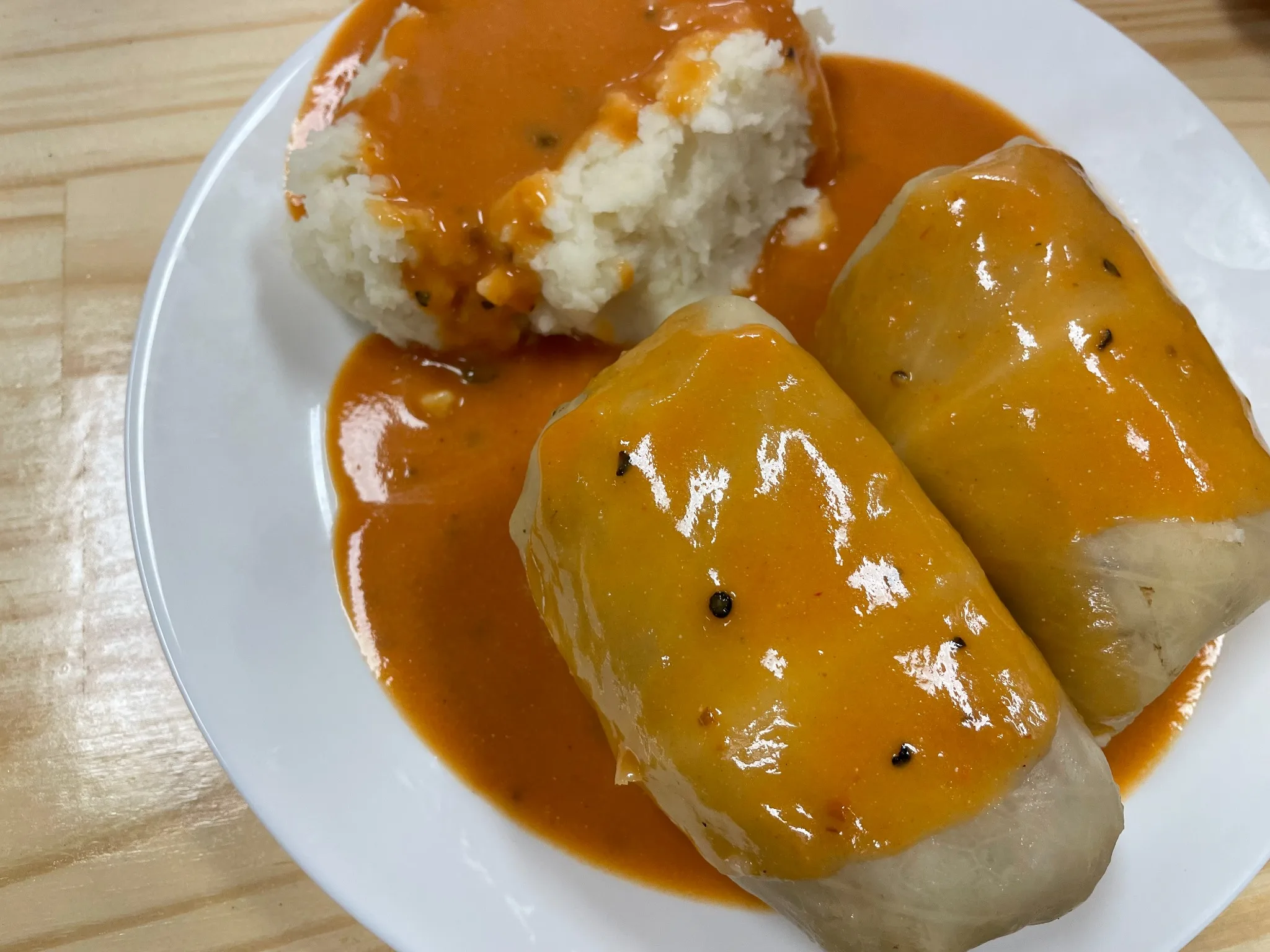 Stuffed cabbage rolls covered in tomato sauce, served with mashed potatoes at Kat’s Café & Restaurant.