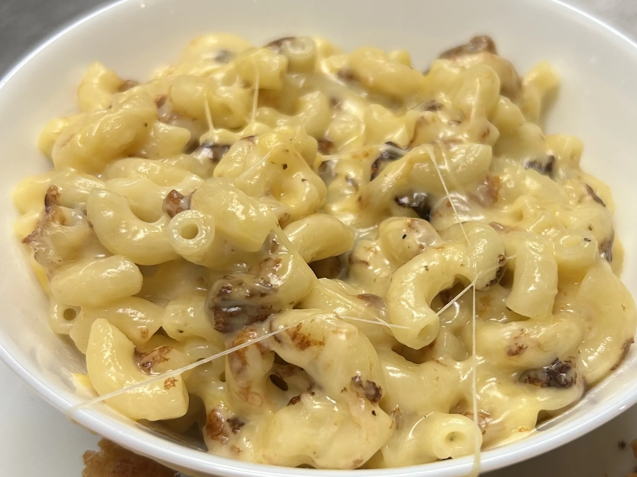 Bowl of creamy baked-style macaroni and cheese at Kat’s Café & Restaurant.
