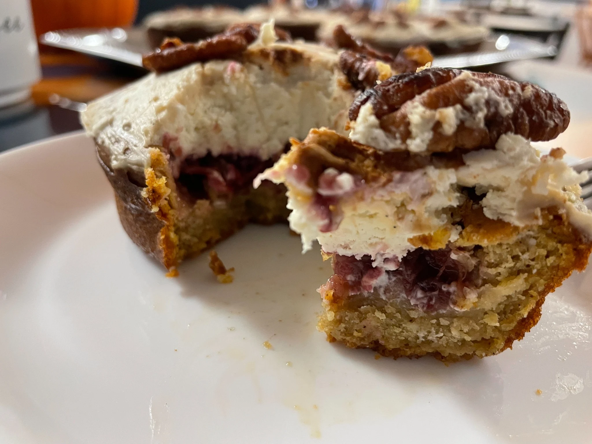 Pumpkin mini cakes at Kat’s Café layered with cranberry filling, cream cheese frosting, and toasted pecans.