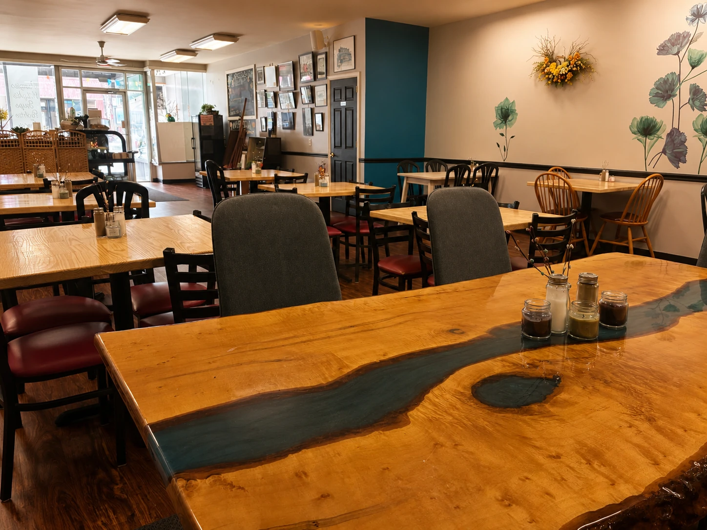 Interior of Kat’s Café & Restaurant in Minersville, featuring a custom live-edge resin table and a welcoming atmosphere.