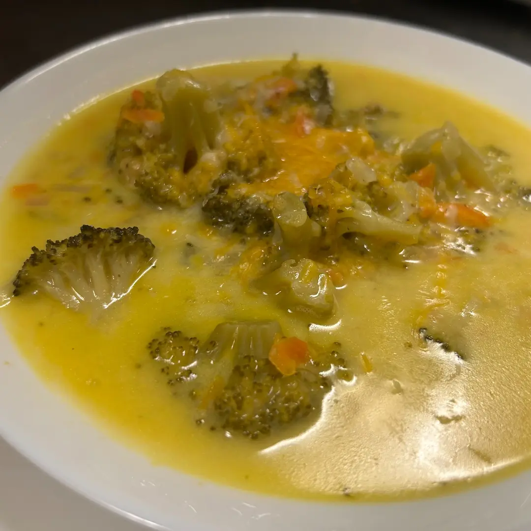 Rich, creamy broccoli cheddar soup at Kat’s Café & Restaurant, made from scratch with tender broccoli florets, vegetables and melted cheddar.