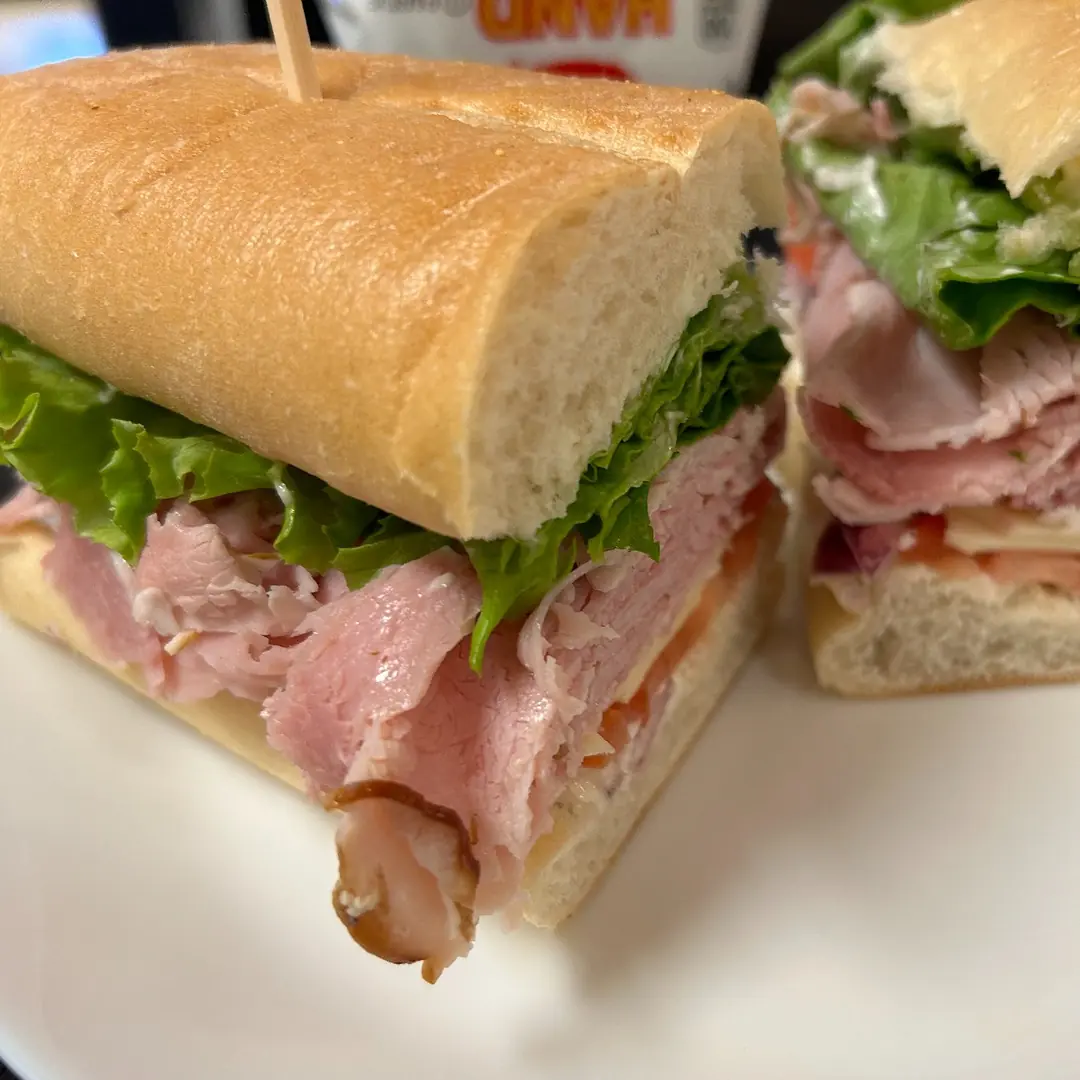 Country ham sub at Kat’s Café & Restaurant with sliced ham, cheese, lettuce, tomato, and onion on a fresh hoagie roll.