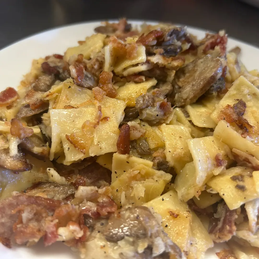 Haluski at Kat’s Café & Restaurant featuring broad noodles with cabbage, mushrooms, and savory pieces of bacon.